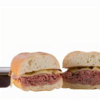 Beef Dip · House-made freshly baked roasted beef and melted Swiss cheese served hot on a toasted French...