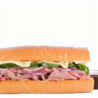 Roast Beef Spicy · House-made freshly baked roast beef and melted Swiss cheese with onion and jalapeño peppers ...