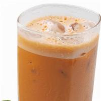 Thai Milk Tea · Our strong-brewed Thai black tea is combined with spices such as star anise, crushed tamarin...