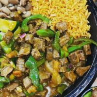 Steak Picado · Tender pieces of chopped steak, sautéed bell peppers, onions, and pico de gallo mixed in a b...