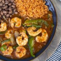 Camarones Rancheros · Fresh shrimp cooked in jalapeño butter, sautéed vegetables, pico de gallo, and a blend of ou...