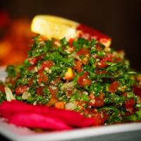 Taboulie Salad · Chopped Italian parsley mixed with bulgur, tomato, green onion, fresh mint, freshly squeezed...