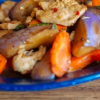 Spicy Eggplant · Stir fried carrot, eggplant, bell pepper in spicy basil sauce.