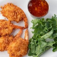 Coconut Shrimp · Coconut crusted shrimp served with house made orange chili dipping sauce
