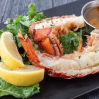 Grilled Maine Lobster Tail · 5 oz. Lobster tail grilled and served with herb butter and lemon.