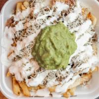 Super Fries · Choice of meat served with monterey jack cheese, beans, guacamole, sour cream.
