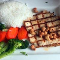Chicken Plate · Chicken breast topped with cashews served with steamed vegetables, steamed rice, and a side ...