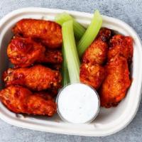 Buffalo Wings · Heat: 6/10 - The classic, not-crazy-spicy, tangy and creamy buffalo wings we all know and lo...