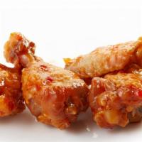 Basket Of Sweet Chili Wings · Fresh batch of wings smothered with a sweet chili sauce.