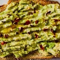 Avocado Toast · Fresh house made avocado spread served on two slices of multi-grain toast, topped with water...