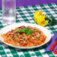 Tomato And Mushroom Pasta · Perfectly cooked pasta with mushrooms, black olives, garlic, and spinach in a marinara sauce.