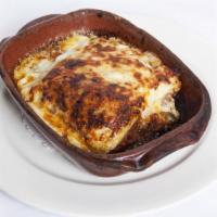 Lasagna · Wood-fired meatball lasagna with bolognese ragu.