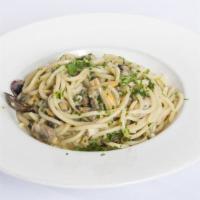 Spaghetti E Vongole · Spaghetti with clams, garlic, spicy red pepper and parsley.