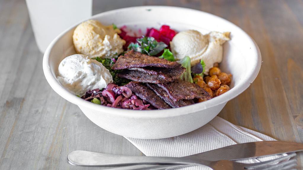 Beets Don’T Kale My Vibe · Salad, spinach, mixed greens, traditional hummus, tzatziki, kale salad, beets, kalamata olives, pita chip croutons. Add Souvlaki Chicken (Chicken breast, lemon, and sour cream), Add Spicy Beef (Grilled steak strips with chili), Add Falafel Balls(5 falafels) & Add Chicken Gyro for an additional charge.