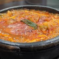 Kimchi Jji Gae · Kimchi stew with tofu and vegetable in beef broth.
