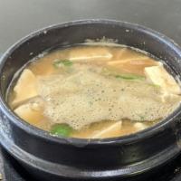 Dwen Jang Jji Gae · Soybean paste stew with tofu and vegetable in beef broth.
