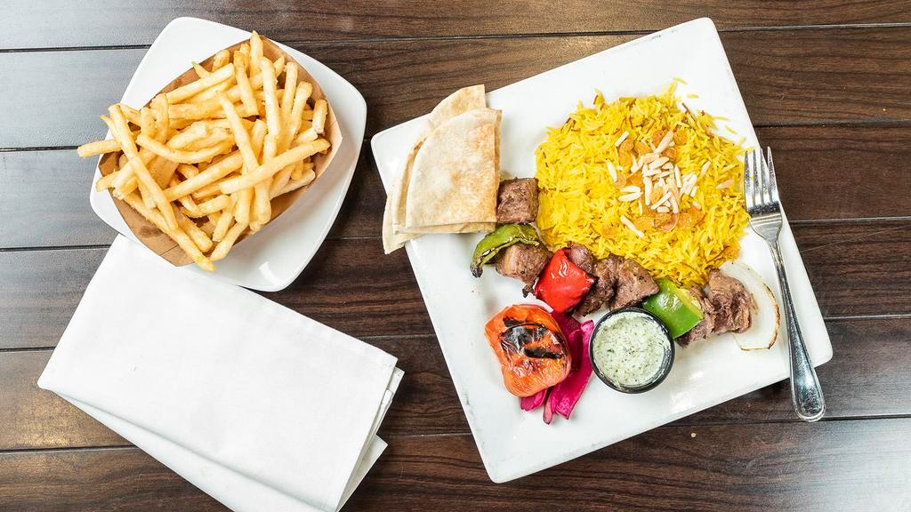 Filet Mignon Tikka Plate · Chunks of grilled marinated filet mignon. Served with rice, pita bread, one side choice, and one side of tzatziki sauce.