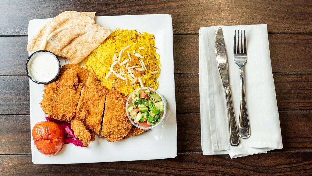 Chicken Cream Chop Plate · Seasoned and breaded chicken breast. Served with rice, pita bread, one side choice  and one side of ranch.