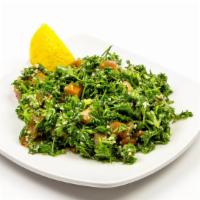 Tabouli · Vegan or Vegetarian. Chopped parsley, green onion, cracked wheat diced tomato tossed with ol...