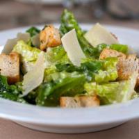 Caesar Salad · Fresh crisp romaine lettuce, shaved parmesan cheese and homemade croutons. Choice of dressin...