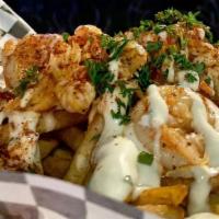 Shrimp Loaded Fries · Shrimp loaded with fries with cheese and our special sauce
