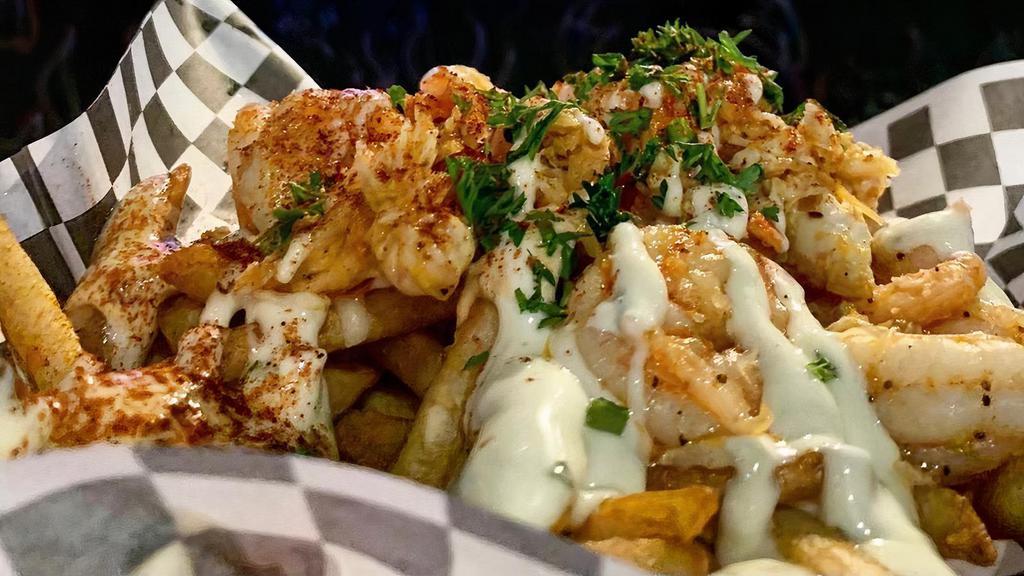 Shrimp Loaded Fries · Shrimp loaded with fries with cheese and our special sauce