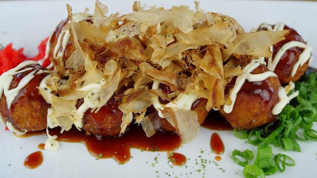 Takoyaki · 8pcs fried squid balls , mayo , scallion, bonito flake