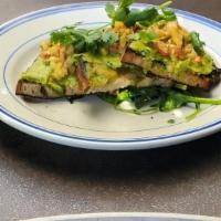 Avocado Toast · grilled organic olive bread, cucumber onion relish, olive oil