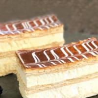 Large Napoleon · Puff pastry layered with Bavarian cream and topped with caramel.