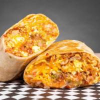 Sausage Breakfast Burrito · Flour tortilla with scrambled eggs, sausage, tater tots and melted jack and cheddar cheese w...