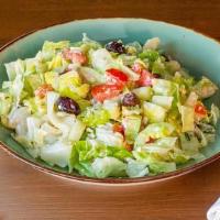 Mediterranean Salad · Romaine lettuce, tomatoes, cucumber, Kalamata olives, and feta cheese in a vinaigrette dress...