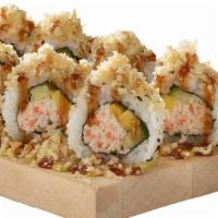 Crunchy · Bestseller. In: krab, avocado , cucumber & shrimp tempura.
Top: crunchy flakes & eel sauce