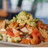 The Cobb · Gluten free. Chopped romaine hearts, chopped tomato, red onion, bacon, egg, gorgonzola, avoc...