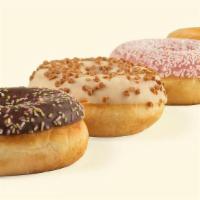 Donut Bag · A selection of glazed, chocolate confetti, pink confetti & caramel magic doughnuts