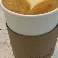 Golden Poppy Latte · Double shot espresso w/ Vanilla Turmeric Chai & steamed milk/ iced milk