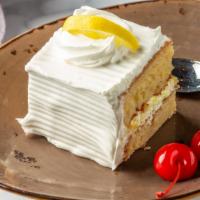 Tres Leches Cake · Layers of sponge cake soaked in a melange of milk spiked with cinnamon and filled with custa...