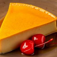 Flan · A luxurious baked custard, with a hint of canela-Mexican cinnamon and a rich caramelized top...