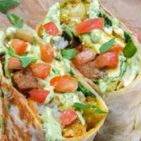 Beyond Breakfast Burrito · 3 fried eggs, beyond sausage, white american cheese, arugula, avocado, tater tots, tomato, s...