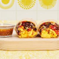 Breakfast Burrito · Eggs, breakfast potatoes, melted cheese, caramelized onions, avocado.