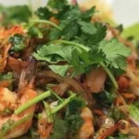 8 Pieces Shrimp Salad · Grilled shrimps with chili, red onion, cilantro and tomatoes with lime juice dressing.