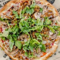 Vegan Pizza · tomato sauce, Daiya vegan cheese, Beyond Meat sausage, roasted garlic, mushrooms, arugula, o...