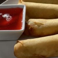 Crispy Spring Rolls · Vegetarian. Crispy rolls stuffed with vegetables. Served with sweet and sour sauce.