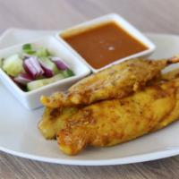 Chicken Sate Or Tofu Sate · Skewers of chicken tender or pork tender or firm tofu marinated in Thai spices. Served with ...