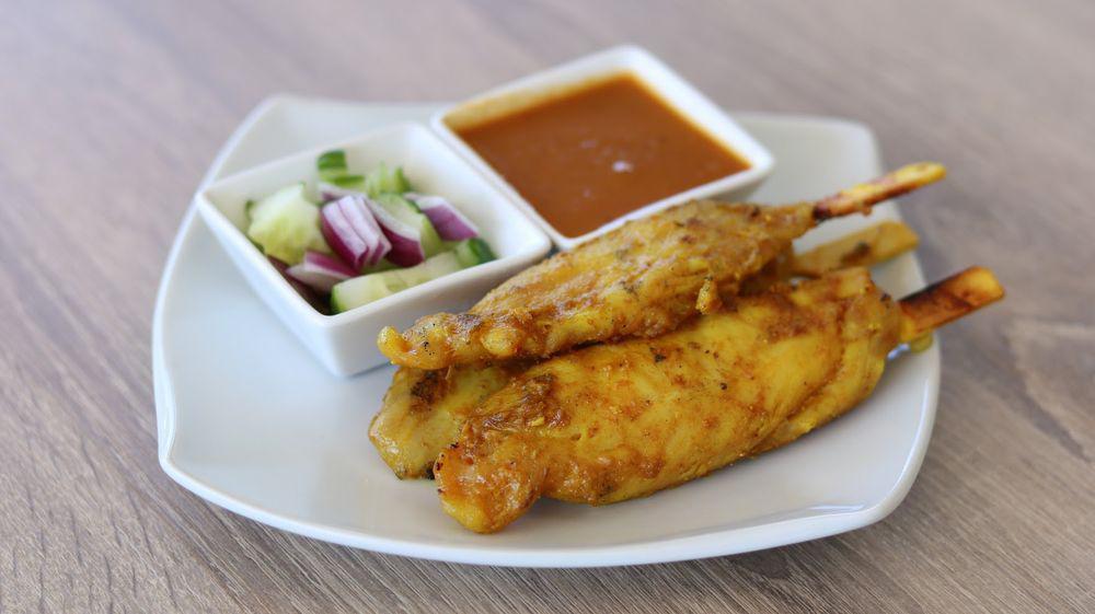 Chicken Sate Or Tofu Sate · Skewers of chicken tender or pork tender or firm tofu marinated in Thai spices. Served with peanut sauce, and sweet cucumber sauce.