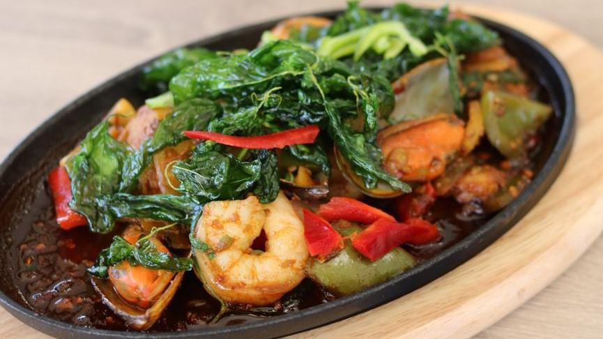 Sizzling Seafood · Mix seafood with Thai herb and spices.