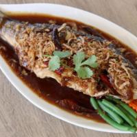 Tamarind Sea Bass · Deep fried whole fish top with sweet tamarind sauce.