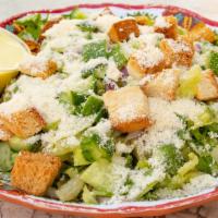 Caeser Salad · Fresh lettuce, cucumber, red onion, Parmesan cheese and croutons. Served with house dressing...
