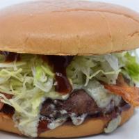 The Bbq Bacon Blue Burger · Sweet baby Ray’s BBQ Sauce, Blue Cheese Crumble, Shredded Lettuce and Bacon.

100% Fresh Gro...