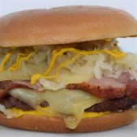 The Pastrami Burger · Thinly Sliced Pastrami, Tangy Sauerkraut, Yellow Mustard, and Melted Swiss Cheese.

100% Fre...