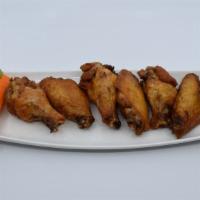 Jumbo Plain Chicken Wings · Large wings marinated overnight in a rub, slow cooked and deep fried. Served with crisp cele...